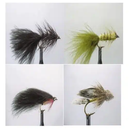 Este conjunto de cuatro moscas artificiales de pesca distintas, cada una de ellas sujeta con anzuelos individuales, forma parte de la colección KIT MOSCAS DRAGON STREAMERS (modelo ZATH003 WDX). Estas moscas presentan arreglos de plumas y pelos en negro, verde oliva y varios tonos de gris, lo que las hace ideales para la pesca con mosca para atraer a los peces.