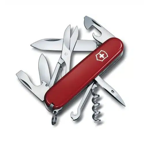 Navaja suiza roja Cortapluma Climber Roja Victorinox 1.3703 14 Funciones, con múltiples herramientas extendidas, entre ellas una hoja, tijeras, abrebotellas, abrelatas, sacacorchos y destornillador. La navaja presenta un logo de cruz blanca en su empuñadura e incluye 14 funciones.