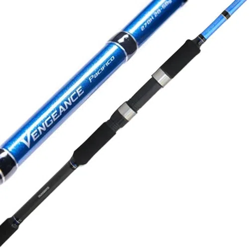 Primer plano de una caña de pescar azul etiquetada "Caña Shimano Vengeance Pacifico 270 Xh" con mangos de espuma negra y detalles plateados.