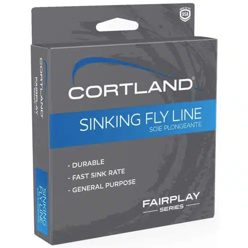 La imagen muestra una caja de línea de hundimiento Cortland de la serie Fairplay, específicamente la línea Cortland Fairplay WF5S 27M. El empaque resalta características clave como durabilidad, alta tasa de hundimiento y uso general. La caja es mayoritariamente gris con detalles en azul y texto en inglés y francés.
