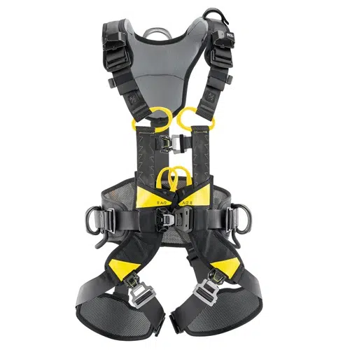 Se muestra un arnés de seguridad negro y amarillo, el Arnés Industrial Petzl Volt Europeo, con múltiples correas ajustables, hebillas y acolchado. Diseñado para escalada o uso industrial, cuenta con perneras, correas para hombros y puntos de sujeción para una sujeción y sujeción seguras.