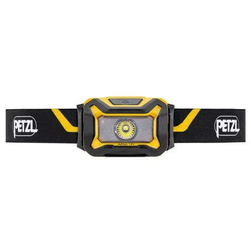La Linterna Frontal Petzl Aria 1R 450lm es una linterna frontal de color amarillo y negro, que incorpora una luz LED central y una correa negra ajustable con el logotipo de Petzl en los laterales. Su diseño compacto y resistente la hace perfecta para aventuras al aire libre.