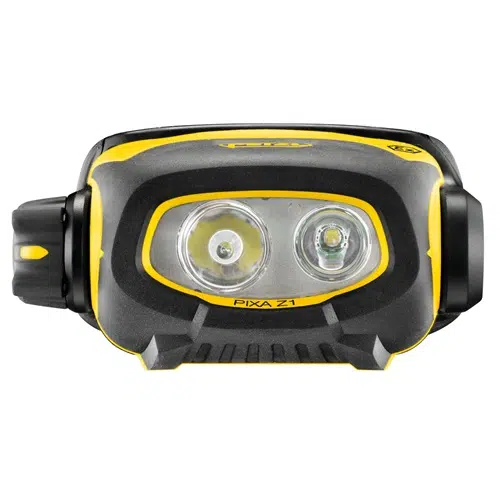 La Linterna Frontal Petzl Pixa Z1 es una linterna frontal robusta y compacta de color negro y amarillo equipada con dos potentes luces LED, lo que la hace ideal tanto para aventuras al aire libre como para tareas industriales.