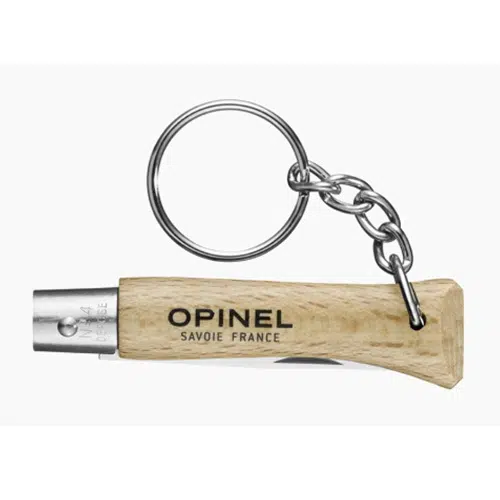 El llavero Navaja Opinel Llavero N°4 de Acero Inoxidable presenta un mango de madera con el grabado "OPINEL SAVOIE FRANCE" y un llavero de metal duradero. Su hoja de acero inoxidable es parcialmente visible, cuidadosamente plegada dentro del mango.