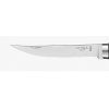 Primer plano de una hoja de acero inoxidable de la colección Cuchillo Opinel, etiquetada como "Opinel Inox". Presenta un filo fino y curvo y una ranura estrecha cerca del lomo. La hoja es parcialmente visible, mostrando una pequeña porción de su mango de Padouk N°08.