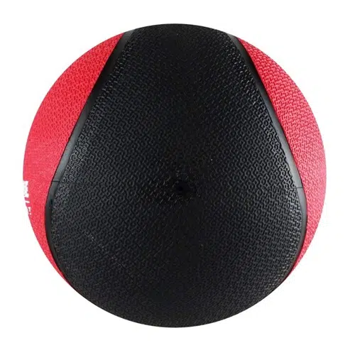 El “Balón Medicinal con Rebote 1kg” presenta un diseño texturizado en forma de lágrima de color rojo y negro, lo que lo hace ideal para entrenamientos dinámicos.