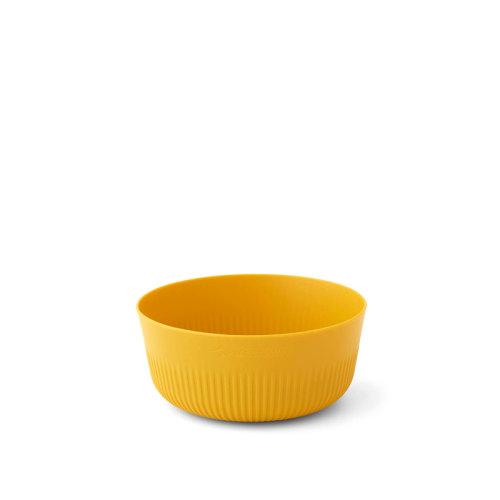 El cuenco Passage de Sea to Summit, de un amarillo vibrante, presenta un diseño limpio y suave, complementado por una textura sutilmente acanalada en la sección inferior. El cuenco se presenta sobre un fondo blanco liso.