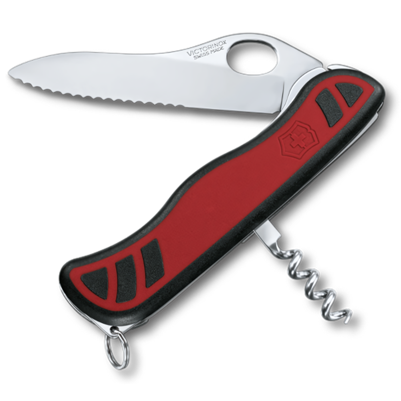 La navaja suiza Victorinox Alpineer 0.8321.MWC Cortapluma, de color rojo y negro, se muestra con la hoja dentada abierta y el sacacorchos extendido. La hoja incluye un orificio para el pulgar para abrirla fácilmente y la navaja está diseñada con un agarre ergonómico que muestra el logotipo de Victorinox.