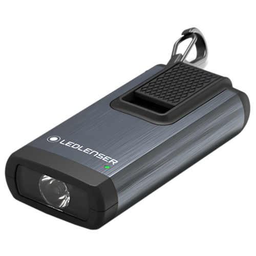 Linterna compacta y eficiente Linterna Llavero Led Lenser K6R 400lm 502577 en color plata y negro, con una pequeña luz indicadora verde. Cuenta con un agarre texturizado, un clip incorporado con un llavero en la parte superior y una bombilla frontal visible para una iluminación óptima.