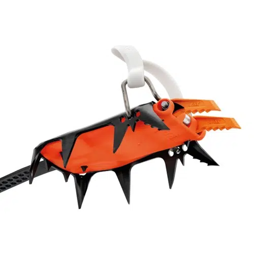 Esta imagen de cerca muestra los crampones modulables Petzl Lynx 2024, unos crampones versátiles para escalada en hielo en color naranja y negro con numerosos clavos afilados. Incluye palancas de ajuste de color naranja y un lazo de sujeción de color blanco, fabricados con una combinación de metal y materiales plásticos resistentes.