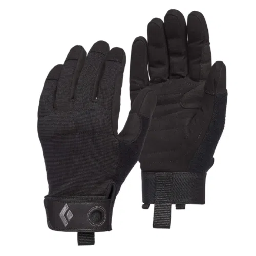 Un par de guantes Black Diamond Crag con agarres texturizados para un mejor agarre, palmas reforzadas y correas de velcro para las muñecas. Los guantes tienen un pequeño logotipo en la lengüeta de la muñeca, con un guante mostrado con la palma hacia arriba y el otro con la palma hacia abajo para una vista completa.