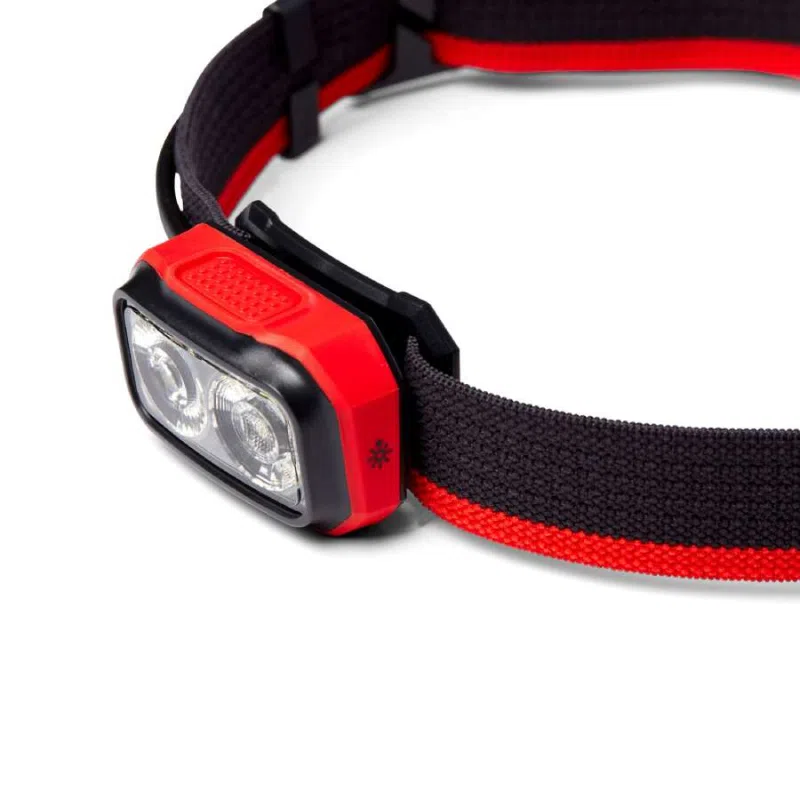 La linterna frontal Black Diamond Onsight 375 cuenta con un diseño rojo y negro con dos luces LED montadas en una correa elástica ajustable, ideal para iluminación con manos libres.