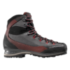 La Zapatilla de Trekking La Sportiva Trango Trk Leather GTX es una bota de senderismo de caña alta en color negro y rojo, ideal para actividades al aire libre, con cordones resistentes, suela texturizada y una marca prominente en el costado y el talón que resalta su diseño robusto y resistente.
