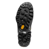 La imagen muestra la suela negra resistente de la zapatilla de aproximación La Sportiva TX5 GTX Mujer, con un patrón texturizado para una mejor tracción y un diseño de banda de rodadura prominente. Un logotipo amarillo está grabado cerca del talón, lo que le aporta estilo.