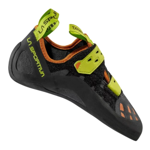La Zapatilla de Escalada La Sportiva Tarantula Mujer es un pie de gato en color negro y verde neón con correas de velcro, con la marca "La Sportiva" y una forma agresiva para los entusiastas de la escalada.
