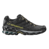 Las zapatillas La Sportiva Ultra Raptor II Leather GTX, de color negro con suela resistente y detalles y cordones verdes, presentan el nombre de la marca impreso en el lateral para destacar su durabilidad. Estas zapatillas de senderismo son perfectas para aventuras al aire libre.