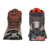Las botas de senderismo La Sportiva Ultra Raptor II Mid Leather GTX Mujer en marrón, gris y naranja se muestran por delante y por detrás, mostrando sus suelas resistentes y su diseño con cordones para mayor durabilidad y funcionalidad al aire libre.