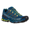 La Sportiva Ultra Raptor II es una zapatilla para trail running con una suela resistente, combinación de colores azul y amarillo, cordones y detalles amarillos, puntera negra y marca lateral detallada para un rendimiento superior.