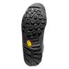 Primer plano de una suela negra de la zapatilla La Sportiva Boulder X Mujer, que muestra sus patrones circulares y ondulados. Un logotipo amarillo se encuentra cerca del centro. El diseño de agarre detallado se destaca sobre un fondo blanco, ideal para terrenos de aproximación.