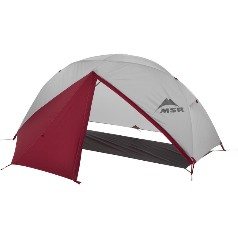 La Carpa MSR Elixir 1 es una carpa tipo domo gris y roja que cuenta con una entrada abierta con el logotipo de MSR en un costado. Incluye múltiples estacas y cuerdas tensoras para una mayor estabilidad, ideal para acampar en diversos entornos.