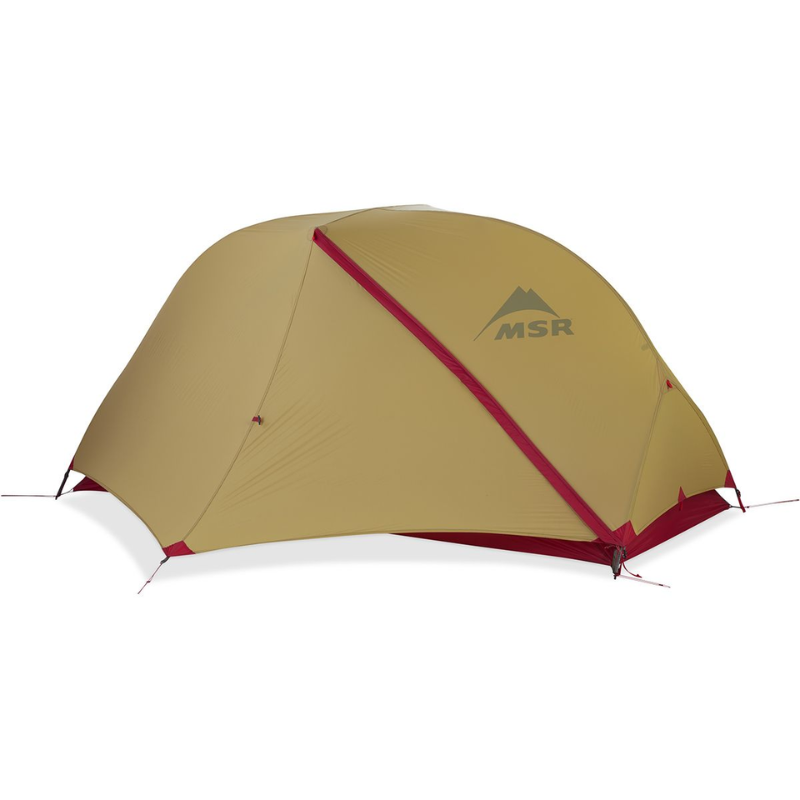 La Carpa MSR Elixir 3 (copia) es una carpa en forma de cúpula de color marrón claro con detalles en rojo y el logotipo de MSR. Se monta con un estilo minimalista mediante estacas, lo que proporciona elegancia y funcionalidad para los amantes de las actividades al aire libre.