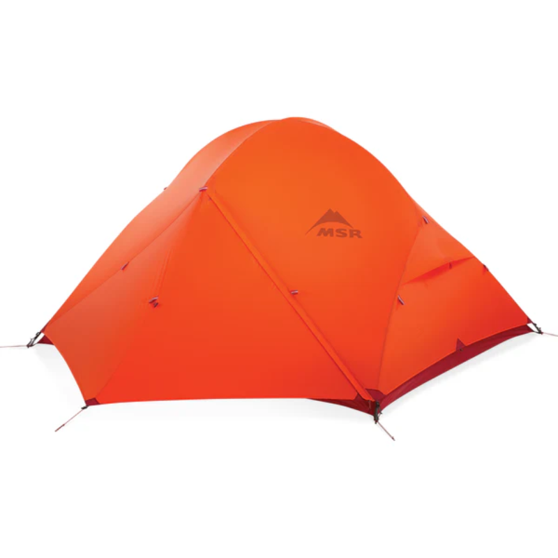 La Carpa MSR Access 2 (copia) es una carpa con forma de cúpula de color naranja brillante que presenta el logotipo de MSR. Tiene un diseño elegante con múltiples costuras para mayor durabilidad y está colocada sobre un fondo blanco plano, lo que resalta su estructura resistente y su color vibrante.