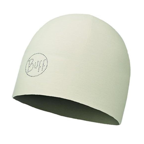 El Gorro Buff Microfibra Reversible Delhi Tobacco (copia) presenta un tono beige claro y un pequeño logotipo circular punteado, ofreciendo una textura suave y un ajuste ceñido para uso informal.