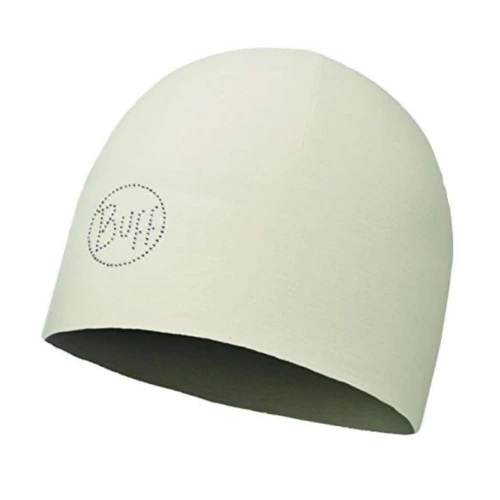 El Gorro Buff Microfibra Reversible Delhi Tobacco (copia) presenta un tono beige claro y un pequeño logotipo circular punteado, ofreciendo una textura suave y un ajuste ceñido para uso informal.