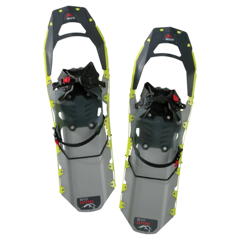Un par de raquetas de nieve MSR Revo Explore en gris y negro con detalles en verde lima, con fijaciones ajustables y marcos resistentes diseñados para brindar tracción y estabilidad. Estas raquetas de nieve MSR Revo Ascent 25 brindan un excelente rendimiento en terrenos desafiantes.