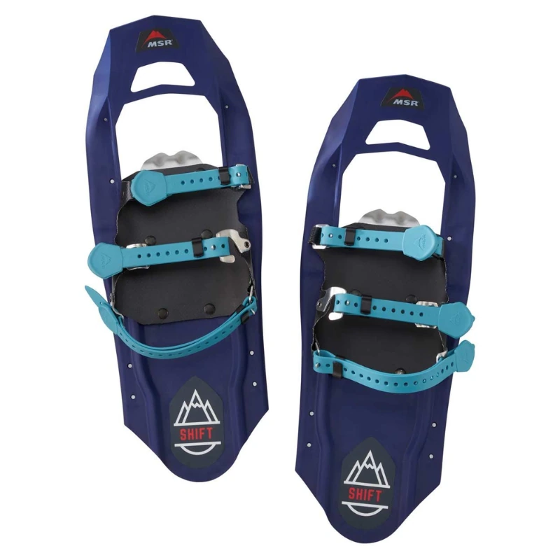 Las Raquetas de Nieve MSR Revo Explorer 25 (copia) son raquetas de nieve azules con correas y hebillas turquesas, diseñadas para la tracción en la nieve. Presentan el logotipo de montaña "SHIFT" y ofrecen un agarre superior en condiciones de hielo.