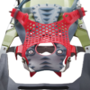 Primer plano de una fijación de Raquetas de Nieve MSR Lightning Ascent 25 (copia) con material de malla roja, componentes metálicos resistentes y una base verde y azul. Su diseño resistente garantiza una pisada segura en actividades de nieve.