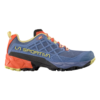 Descubre la zapatilla de montaña para running La Sportiva Prodigio Mujer (copia), una zapatilla de trail azul con suela resistente, detalles en rojo en el talón, detalles en amarillo y un logotipo lateral. Diseñada con malla transpirable, puntera protectora y contrafuerte resistente para un rendimiento superior.