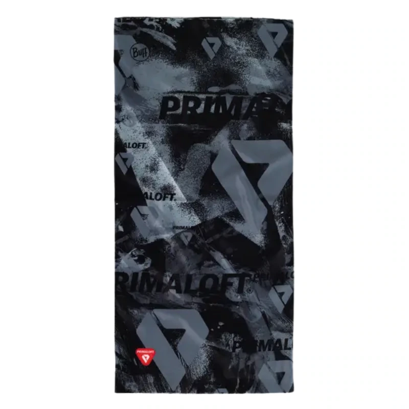 El Bandana Buff ThermoNet Skatick Graphite es una pieza rectangular de tela que presenta un patrón abstracto en negro y gris con logotipos "Primaloft" y triangulares, hecho de material ThermoNet suave, lo que indica que es un gorro o braga para el cuello multifuncional.