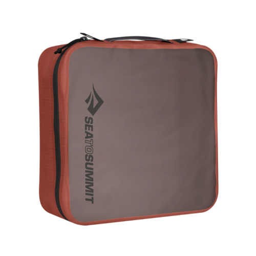 El Bolso Organizador Sea To Summit Hydraulic Packing Cube es un cubo rojo con cremallera, panel frontal transparente y el logo "Sea to Summit" en negro. Está diseñado para uso intensivo y cuenta con un asa superior resistente para transportarlo cómodamente.